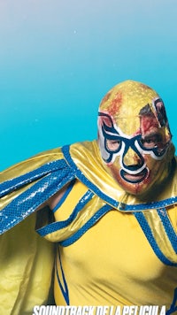 a poster with a man in a yellow mask